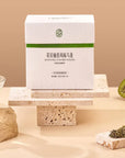 Timebai Kiwi Pomelo Oolong Tea product set showing the packaging, oolong leaves, kiwi fruit, pomelo fruit and brewed tea.