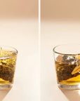 Blueberry Oolong Tea pyramid tea bag brewing with whole tea leaves and tea liquor