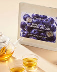 TimeBai Blueberry Oolong Tea pouch with pyramid tea bag and brewed oolong tea