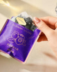 100 plastic-free biodegradable PLA pyramid tea bags with loose leaf oolong tea with blue berry infused.