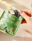 100 plastic-free biodegradable PLA pyramid tea bags with loose leaf oolong tea with kiwi fruit infused.