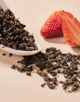 vanilla and strawberry flavored oolong tea crafted from precisely cut premium tie guan yin tea leaves.