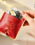 100% plastic-free biodegradable PLA pyramid tea bags with loose leaf Jin Mudan black tea and dried rose.
