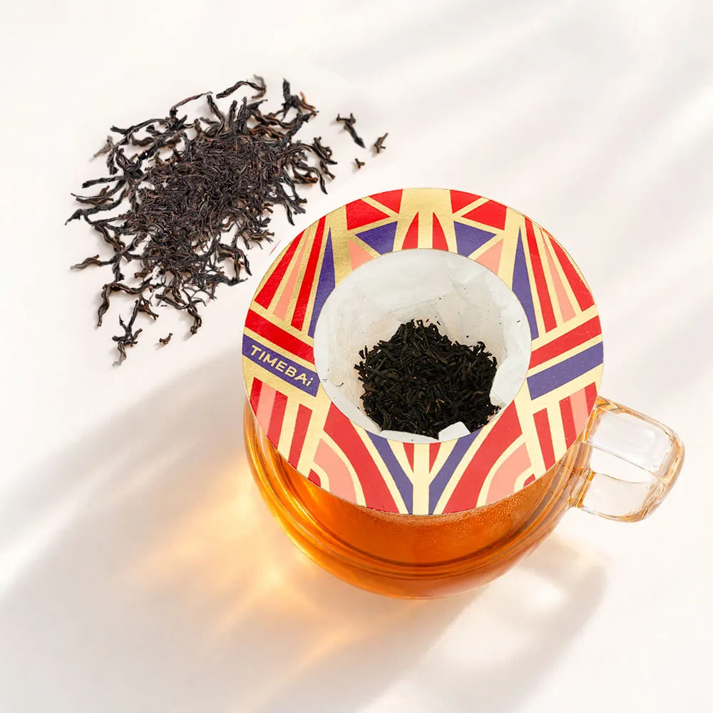 Timebai Ceylon High-Grown Black Tea Brewing in a Glass Cup with a Hanging Filter Bag