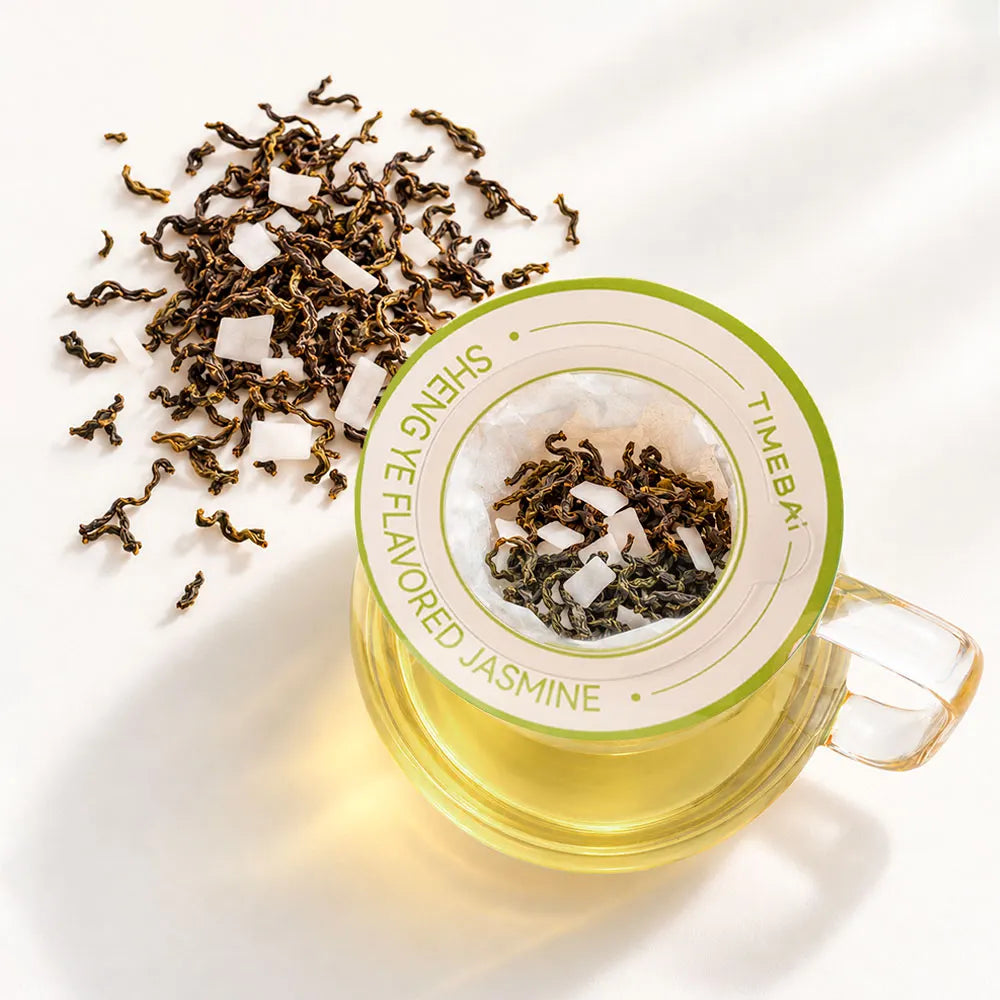 Timebai_Coconut_Jasmine_Tea_brewing_in_a_glass_cup_with_a_hanging_filter_bag