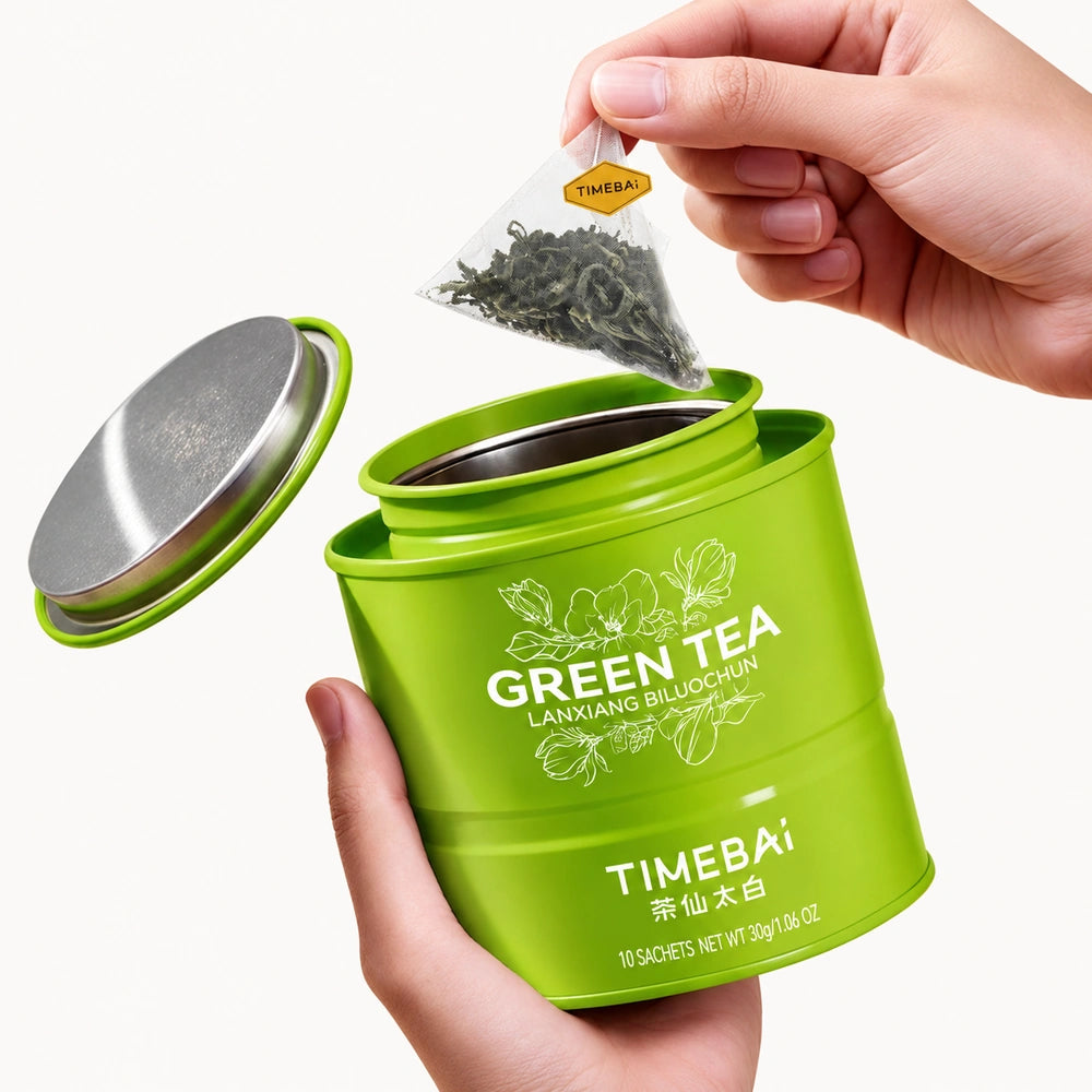 Timebai Orchid Bi Luo Chun Green Tea – Hand Lifting a Pyramid Tea Bag from an Open Tin