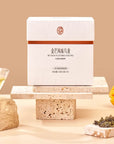 Timebai Mango Oolong Tea product set showing the packaging, oolong leaves, mango fruit and brewed tea.