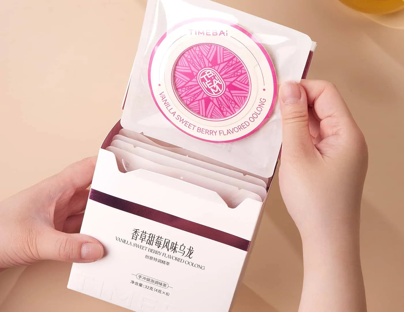 Retail box of Timebai Strawberry Vanilla flavored Tea containing 8 individual UFO tea bag.