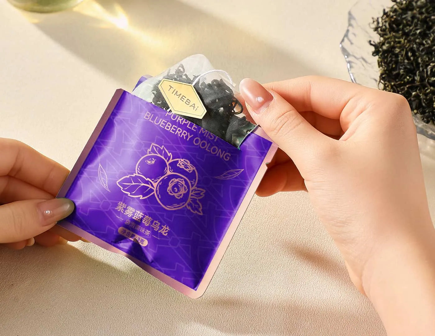 100 plastic-free biodegradable PLA pyramid tea bags with loose leaf oolong tea with blue berry infused.