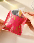 100 plastic-free biodegradable PLA pyramid tea bags with loose leaf oolong tea with white peach infused.