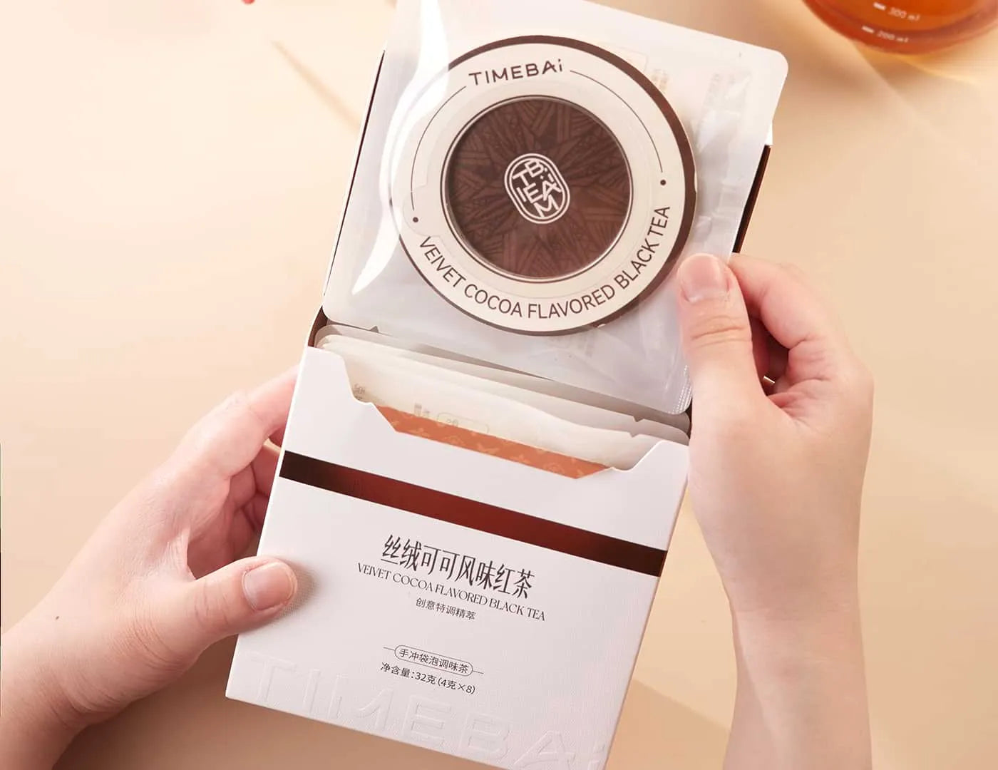 Retail box of Timebai Chocolate Black Tea containing 8 individual UFO tea bag.