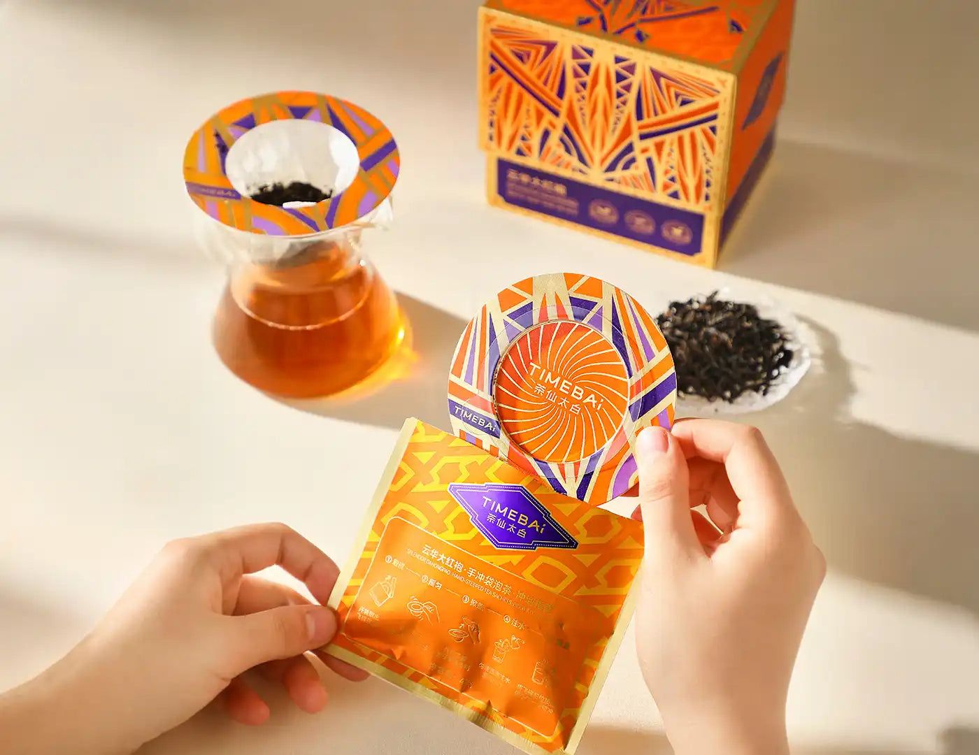 Timebai Da Hong Pao Drip-Disc product set showing the packaging, dark oolong leaves, and brewed tea.