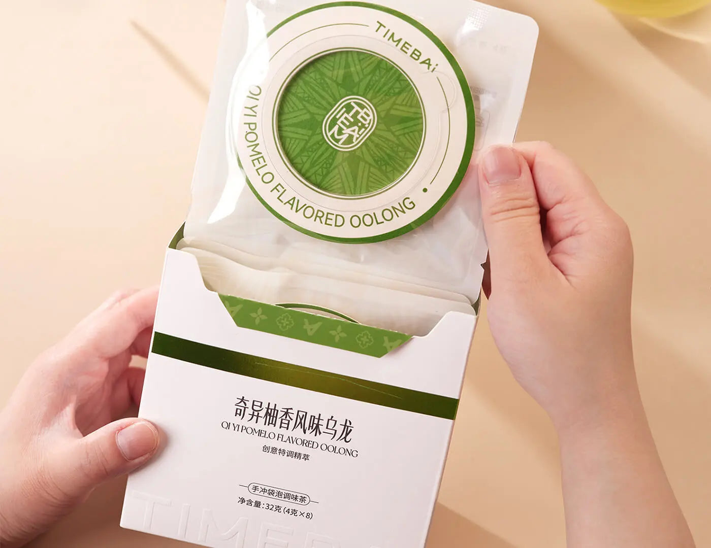 Retail box of Timebai kiwi pomelo flavored Tea containing 8 individual UFO tea bag.