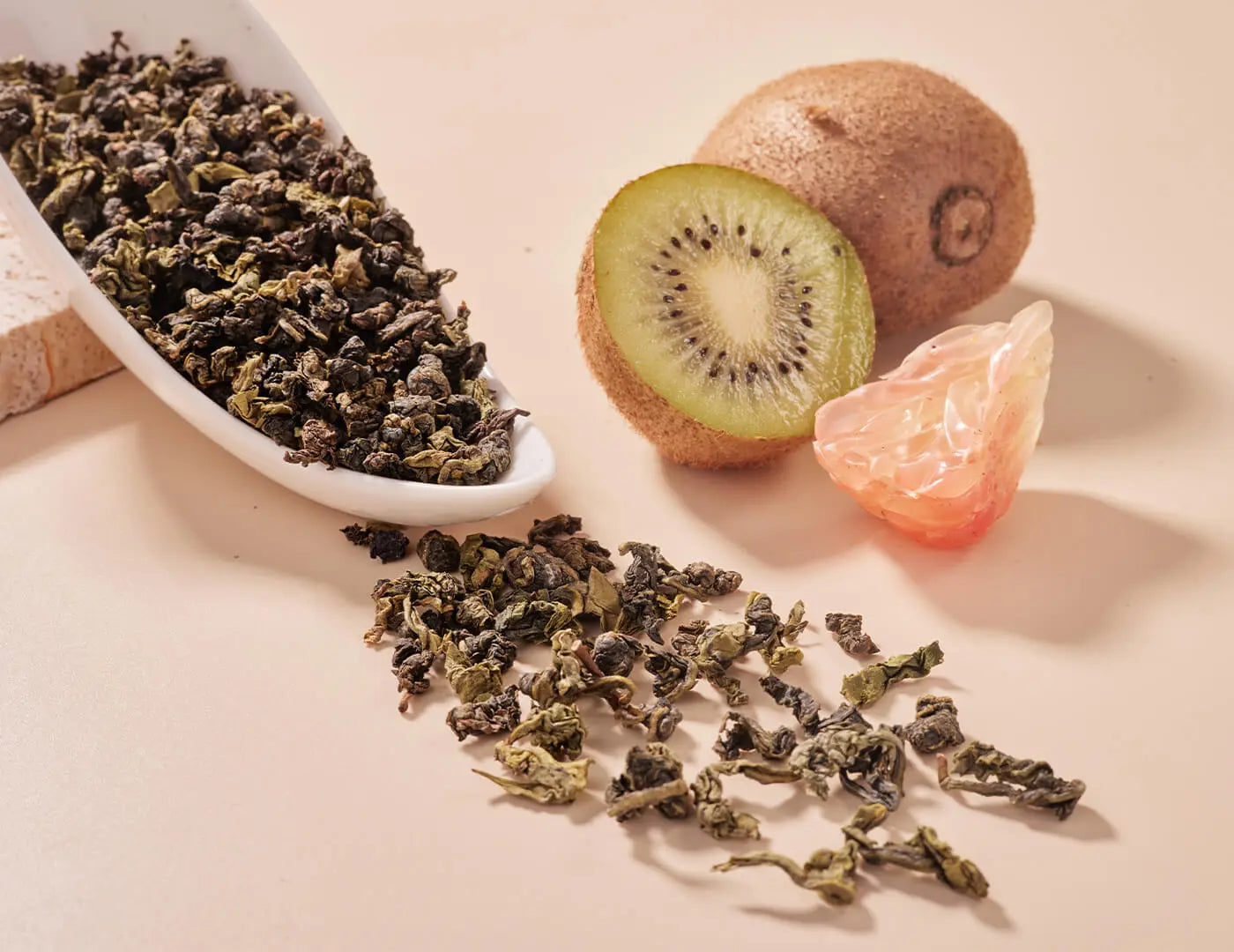 kiwi pomelo flavored oolong tea crafted from precisely cut premium tie guan yin tea leaves.