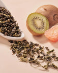 kiwi pomelo flavored oolong tea crafted from precisely cut premium tie guan yin tea leaves.