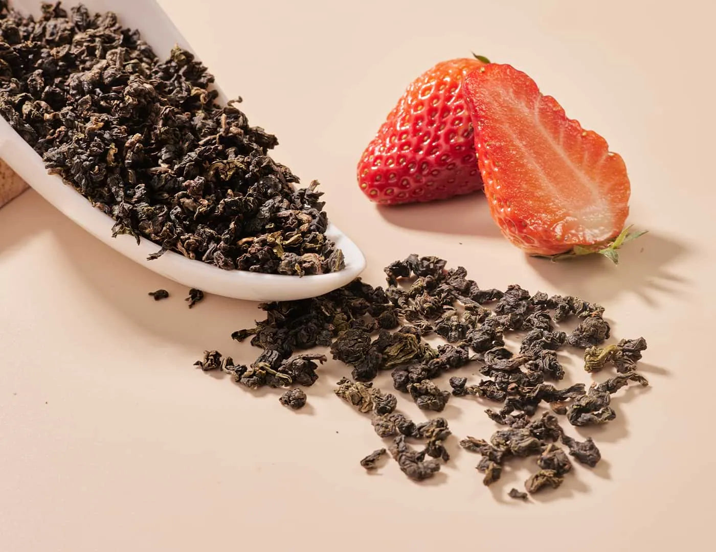 vanilla and strawberry flavored oolong tea crafted from precisely cut premium tie guan yin tea leaves.