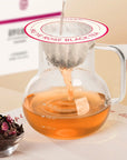 Twilight rose black UFO tea brewing